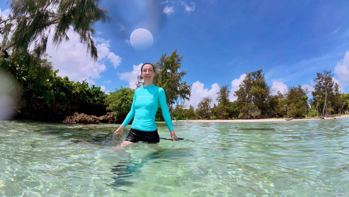 Travellers enjoying the calm waters of Eton Beach in Efate