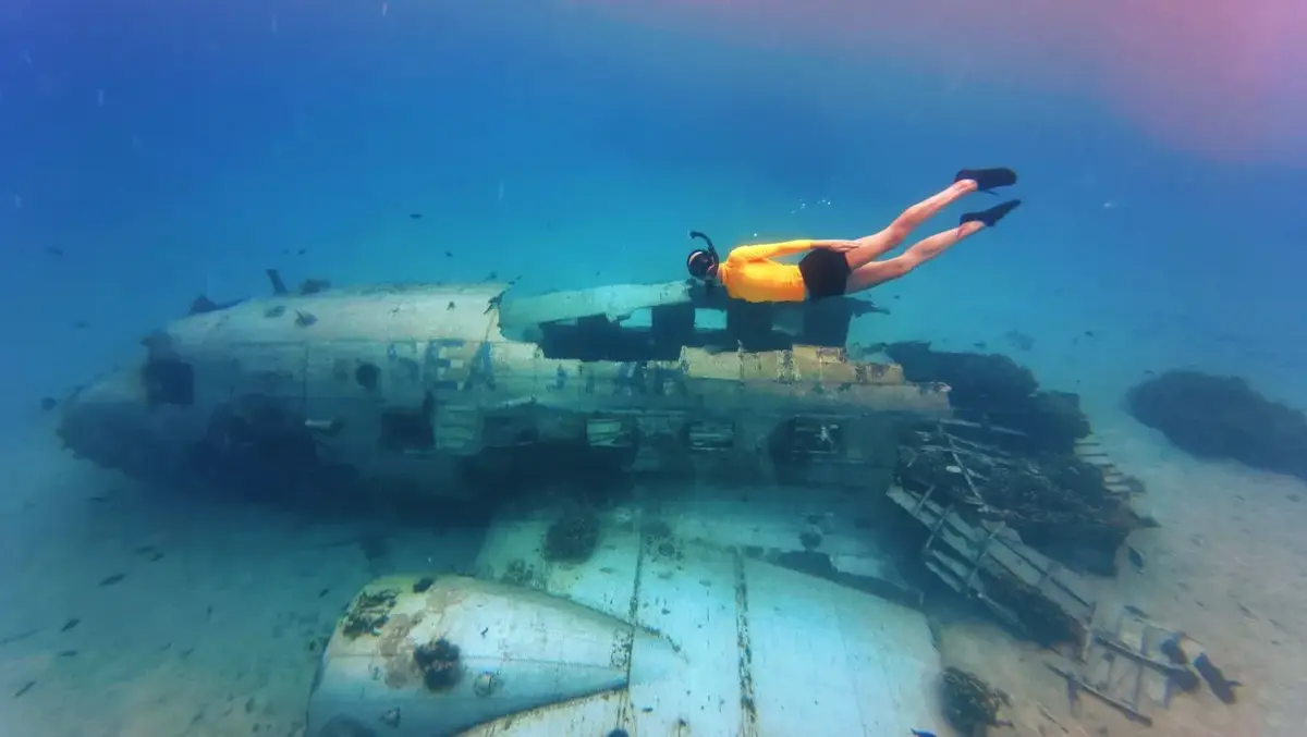 Snorkelling at the Enenamit Island Plane Wreck in Majuro, Marshall Islands