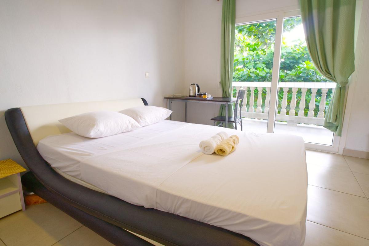 Triple Room offered by Afiafi Hotel